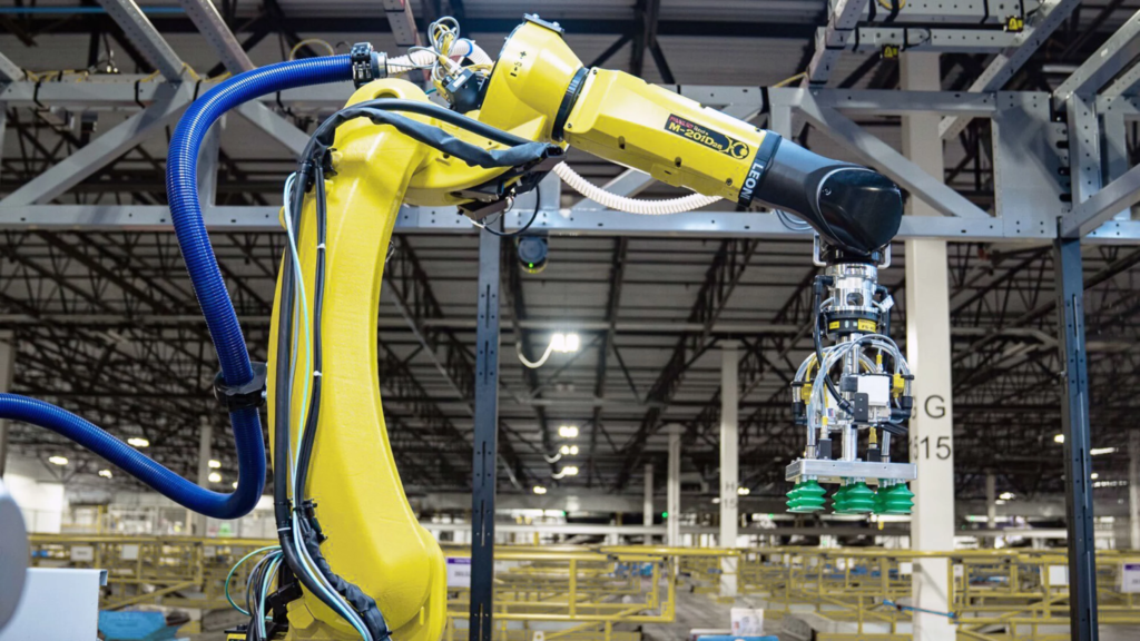 Amazon Employs AI for Smoother Holiday Shopping and Speedier Deliveries 1 Robin, an automated arm used to pick up and place packages in warehouses.